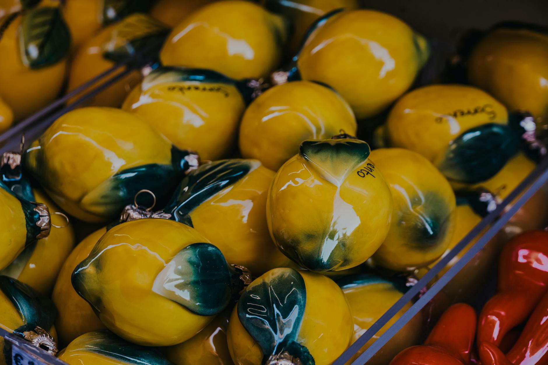 A young couple standing together indoors, holding a blue vibrator, symbolizing modern intimacy.